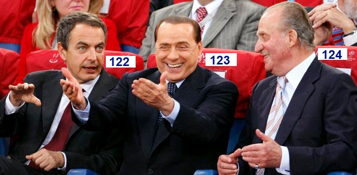 Silvio Berlusconi sentado en el asiento número 123